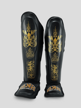SKS Empire Schienbeinschoner - Sak Yant - Echtes Leder - Schwarz / Gold