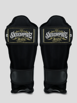 SKS Empire Schienbeinschoner - Sak Yant - Echtes Leder - Schwarz / Gold
