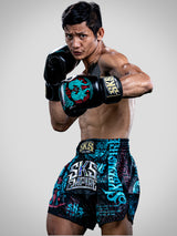 SKS Muay Thai Shorts Sakyant “Stickerbomb” - Zwart / Blauw